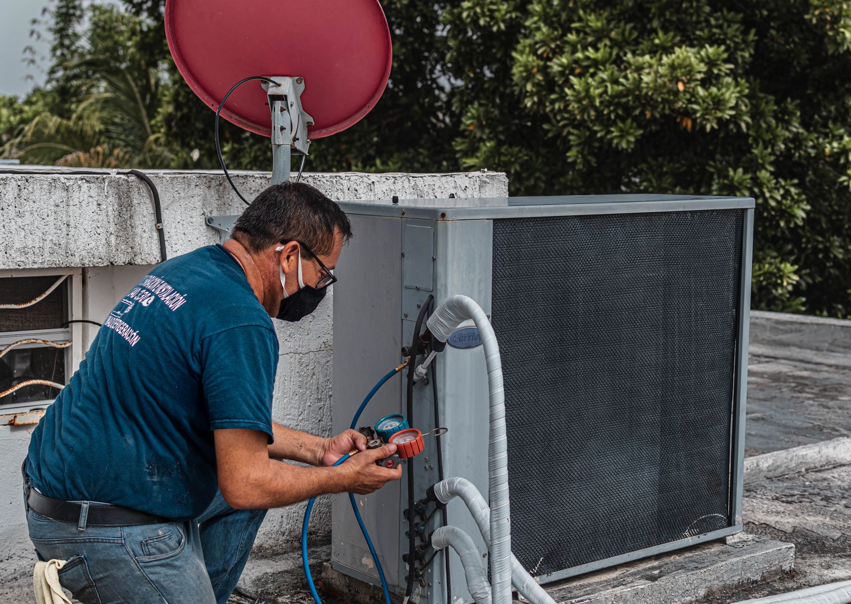 HVAC technician servicing residential equipment